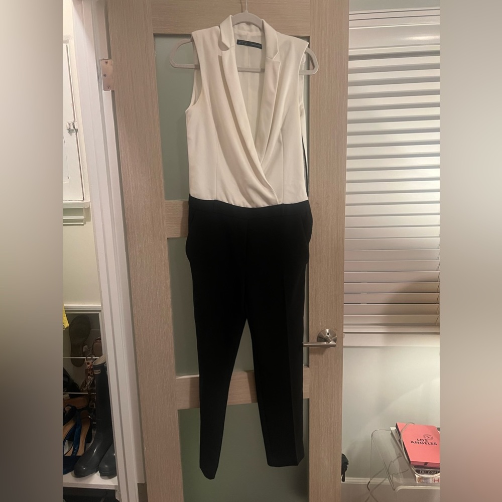 Vest jumpsuit with shoulder pads